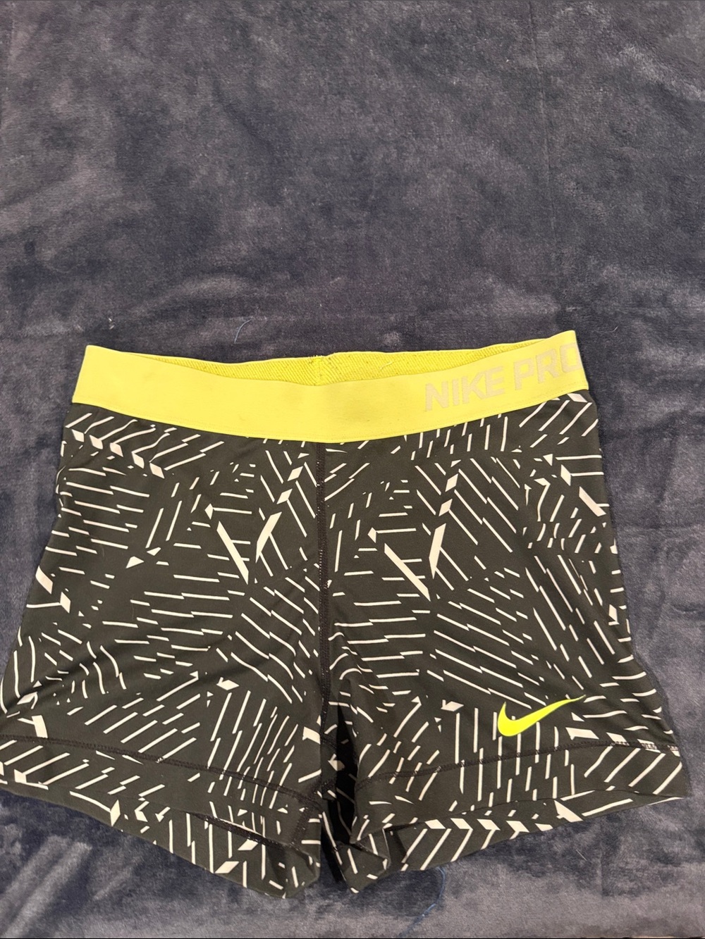 Nike Women's Black Geometric Compression Shorts with Yellow Waistband